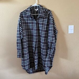 Woman’s long sleeved button down top